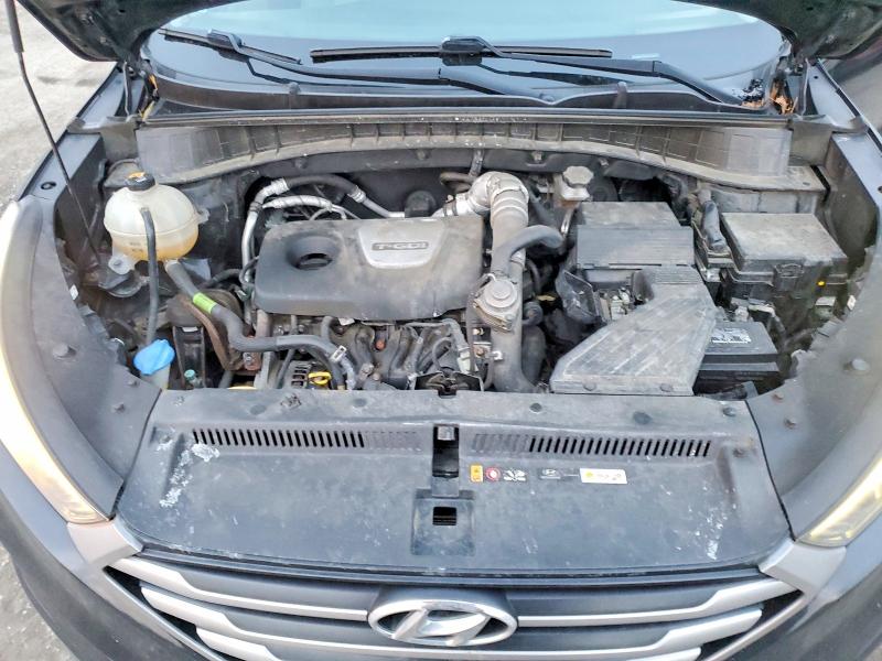 Photo 11 from auction – 2018 HYUNDAI TUCSON VAL with VIN KM8J3CA29JU724675