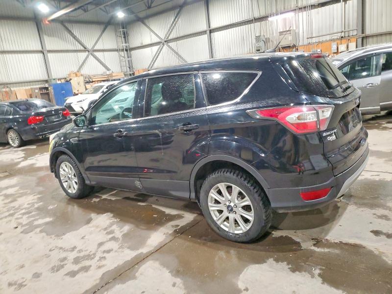 Photo 2 from auction – 2017 FORD ESCAPE SE with VIN 1FMCU9GD4HUA65495