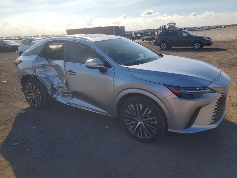 Photo 4 from auction – 2023 LEXUS RX with VIN JTJCHMAA1P2005546