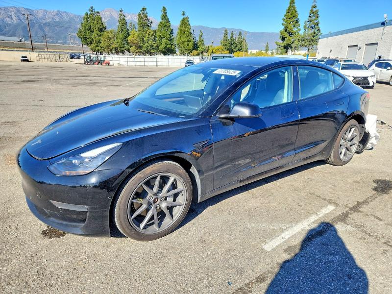 TESLA MODEL 3 2022 with VIN 5YJ3E1EB9NF195541 - Photo from auction