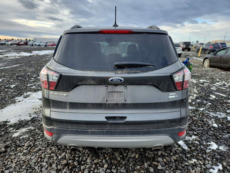 Photo 6 from auction – 2018 FORD ESCAPE SEL with VIN 1FMCU9HD1JUA98667