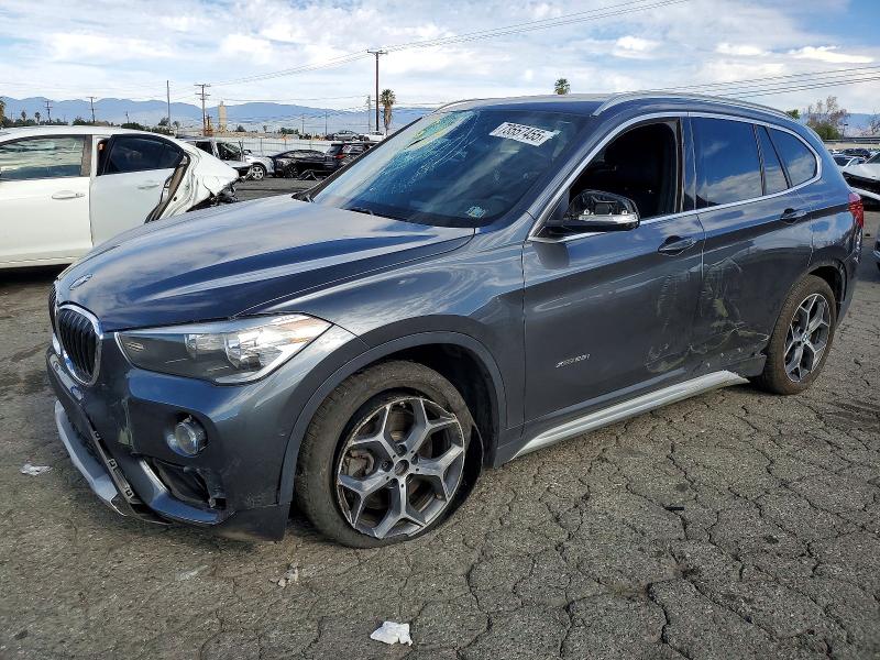 BMW X1 2016 with VIN WBXHT3C31GP886626 - Photo from auction