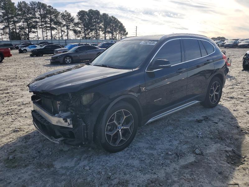 BMW X1 XDRIVE2 2017 with VIN WBXHT3C34H5F69469 - Photo from auction