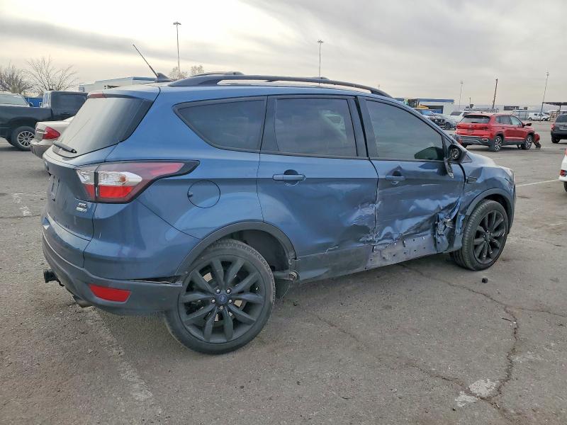 Photo 3 from auction – 2018 FORD ESCAPE with VIN 1FMCU9HD7JUC48443