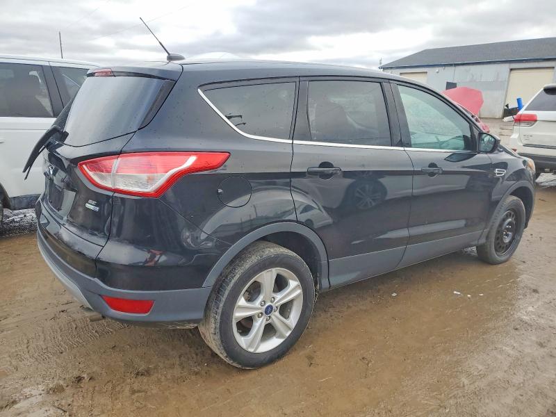 Photo 3 from auction – 2016 FORD ESCAPE with VIN 1FMCU9GX5GUC56464