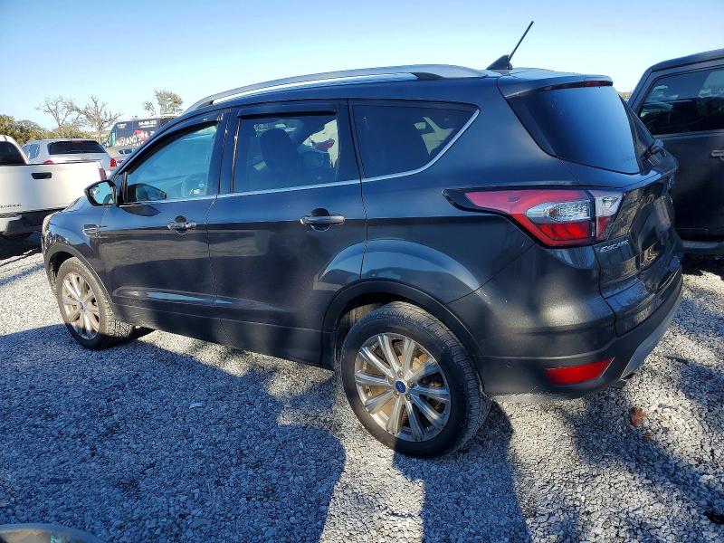 Photo 2 from auction – 2018 FORD ESCAPE TIT with VIN 1FMCU9J98JUA28346