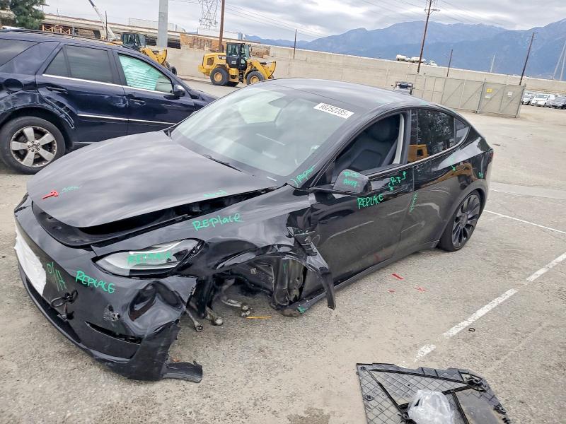 TESLA MODEL Y 2022 with VIN 7SAYGDEF8NF552246 - Photo from auction