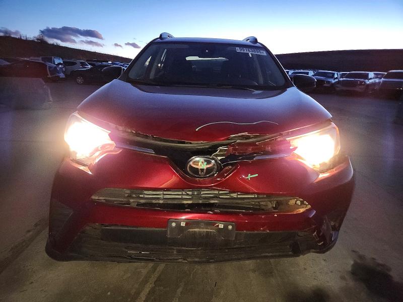 Photo 5 from auction – 2018 TOYOTA RAV4 LE with VIN JTMBFREVXJD227125