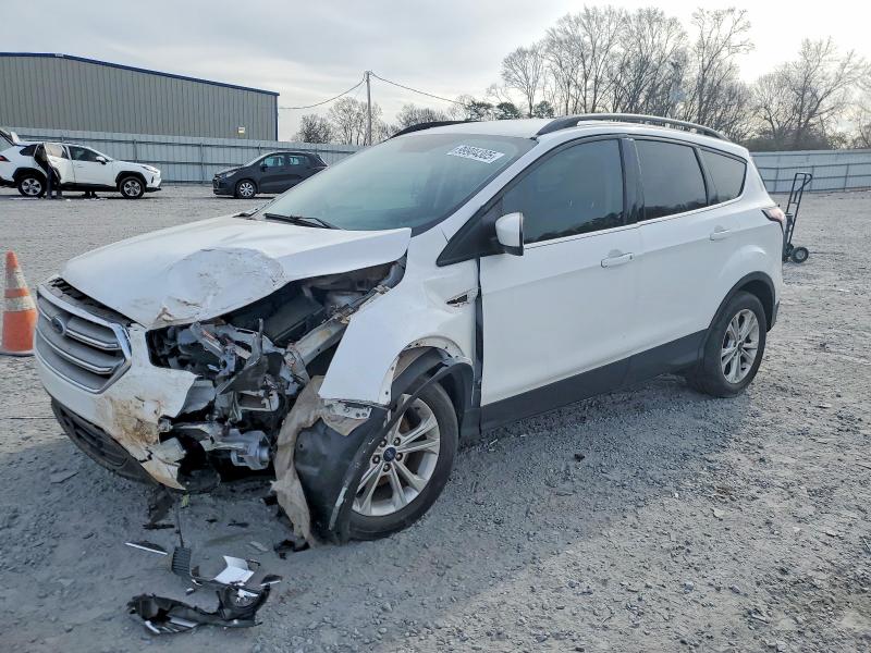 FORD ESCAPE 2017 with VIN 1FMCU0GDXHUE84995 - Photo from auction