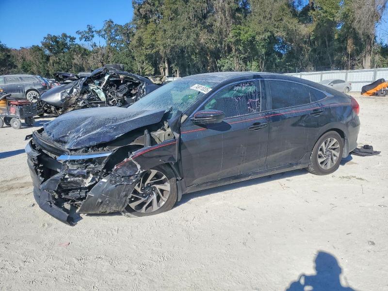 HONDA CIVIC 2018 with VIN 19XFC2F76JE010915 - Photo from auction