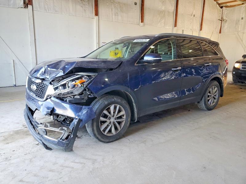 KIA SORENTO LX 2016 with VIN 5XYPG4A33GG067156 - Photo from auction