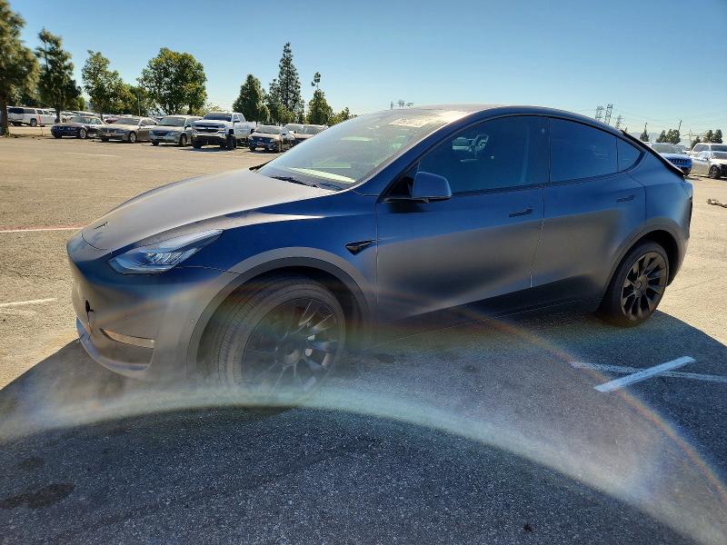 TESLA MODEL Y 2022 with VIN 7SAYGDEE3NA021752 - Photo from auction