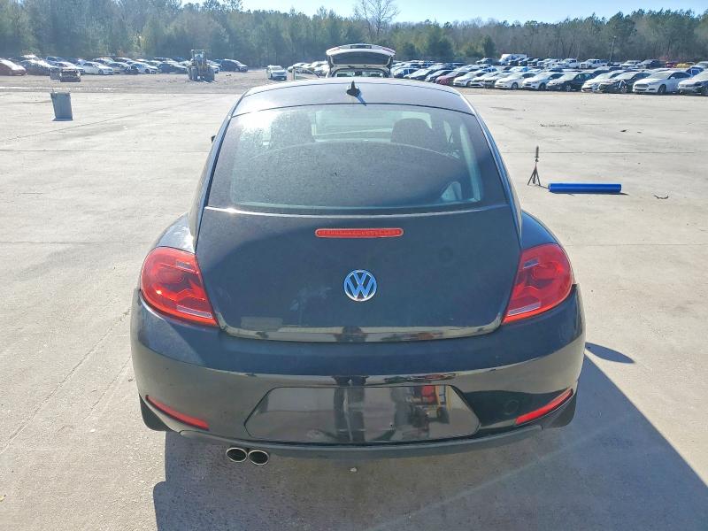 Photo 6 from auction – 2013 VOLKSWAGEN BEETLE with VIN 3VWJP7AT4DM690255