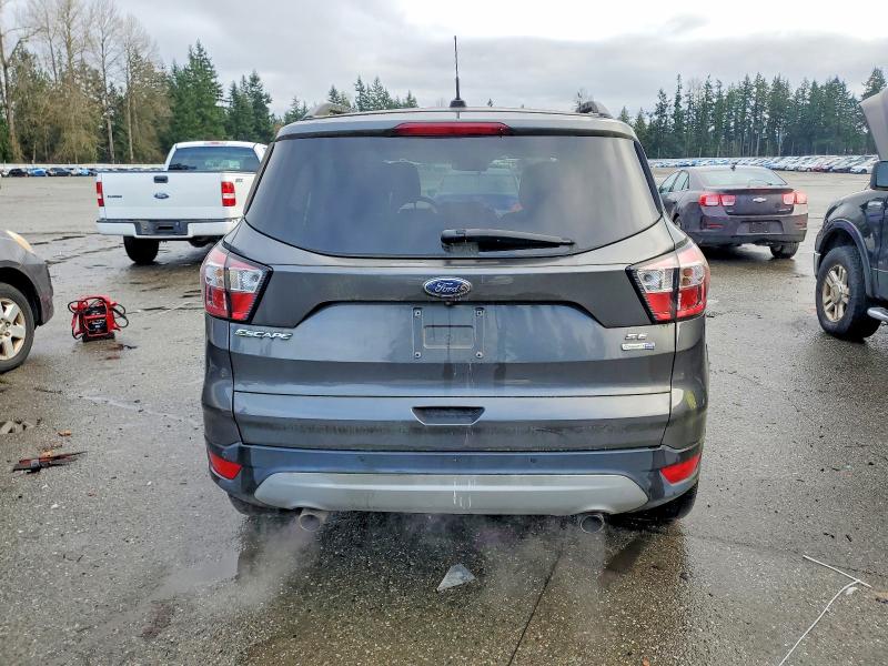 Photo 6 from auction – 2018 FORD ESCAPE SE with VIN 1FMCU9GD8JUD08120