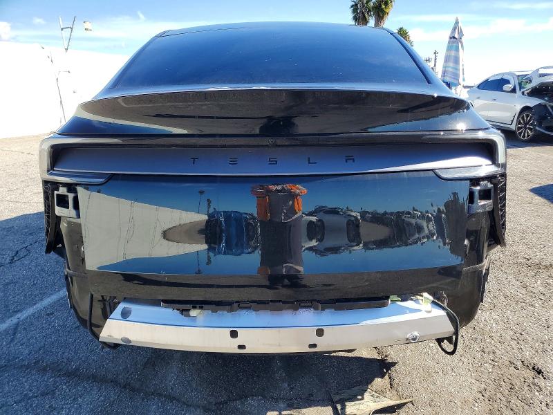 Photo 6 from auction – 2026 TESLA MODEL Y with VIN 7SAYGDED2TF380193