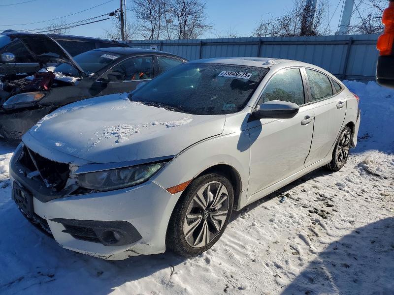 HONDA CIVIC EXL 2016 with VIN 2HGFC1F79GH651596 - Photo from auction