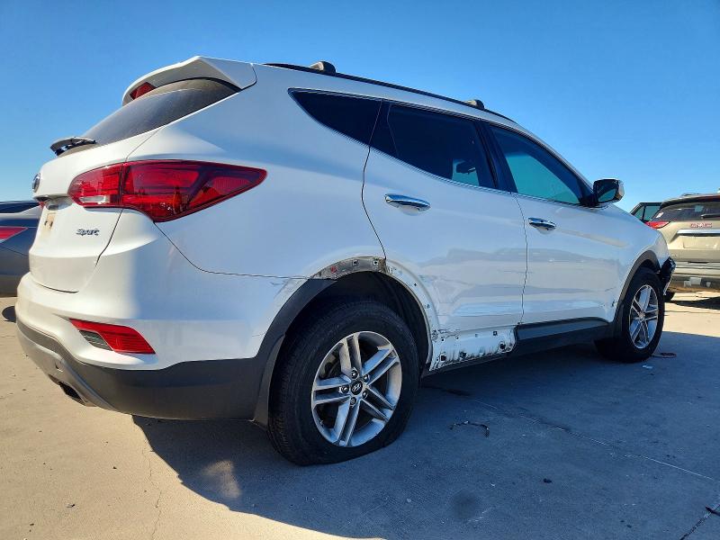 Photo 3 from auction – 2017 HYUNDAI SANTA FE S with VIN 5NMZU3LB8HH048528