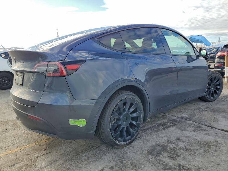 Photo 3 from auction – 2023 TESLA MODEL Y with VIN 7SAYGDEE3PF597976