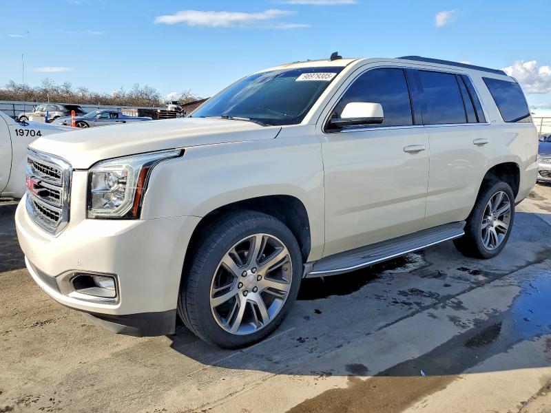 GMC YUKON 2015 with VIN 1GKS1BKC4FR101852 - Photo from auction