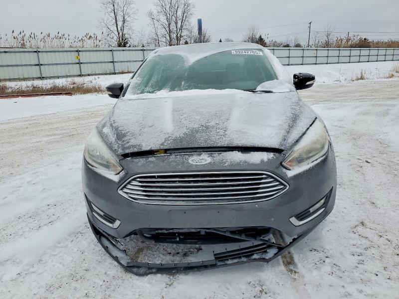Фото 5 с аукциона – 2018 FORD FOCUS с VIN 1FADP3J27JL279399
