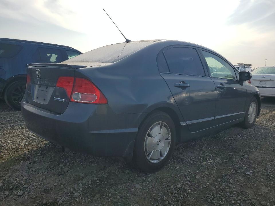 Photo 3 from auction – 2007 HONDA CIVIC HYBR with VIN JHMFA36277S019286