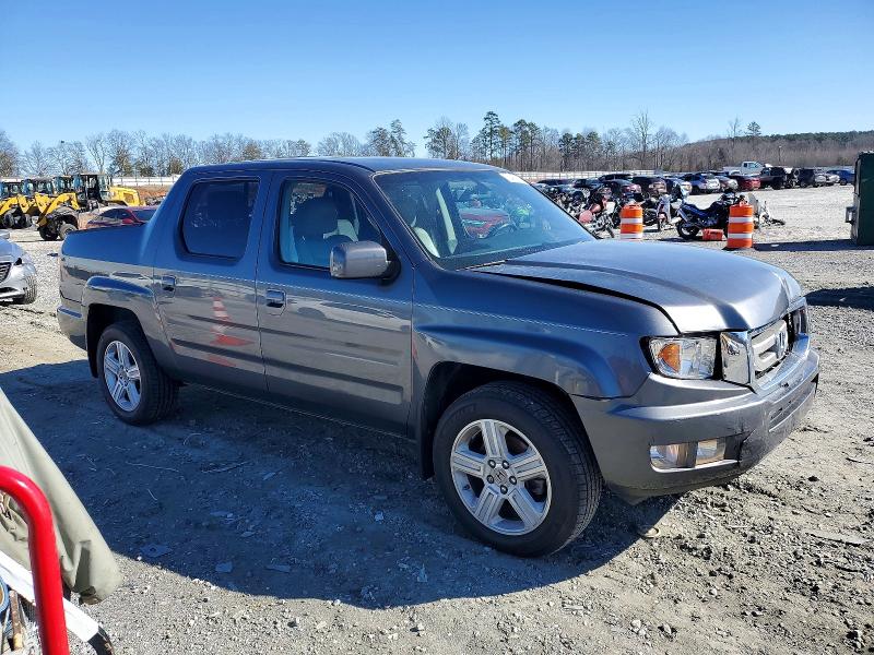 Photo 4 from auction – 2011 HONDA RIDGELINE with VIN 5FPYK1F56BB452715