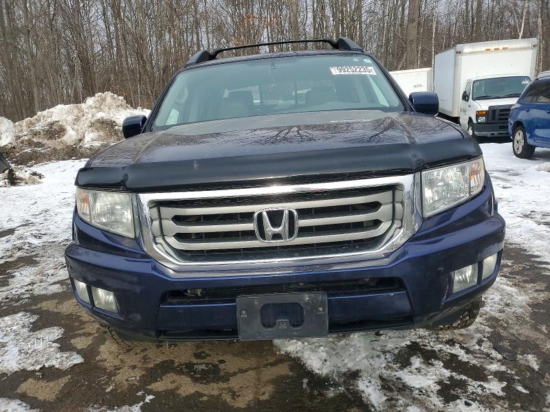 Photo 5 from auction – 2014 HONDA RIDGELINE with VIN 5FPYK1F52EB002323