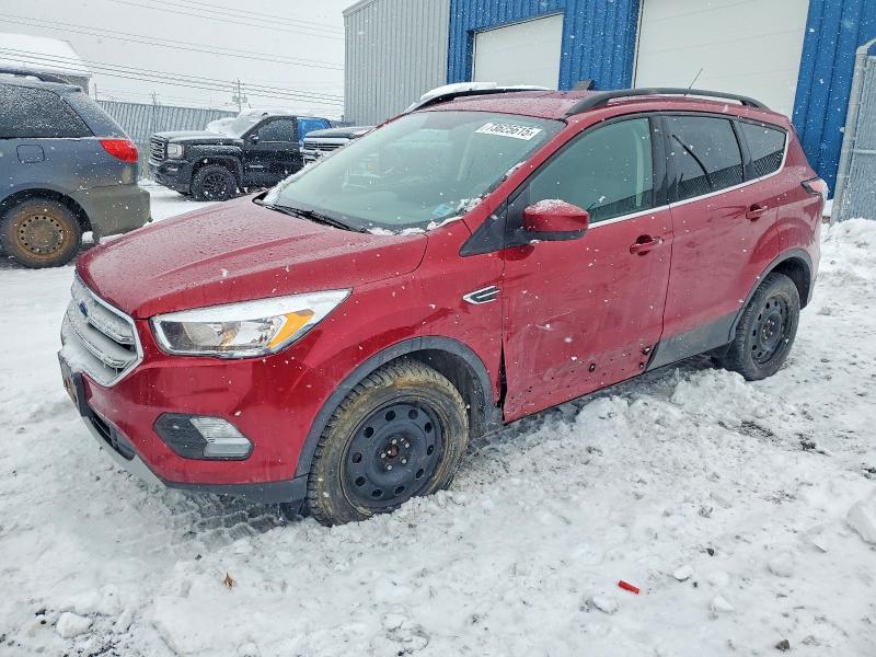 FORD ESCAPE SE 2018 with VIN 1FMCU9GD7JUC92055 - Photo from auction