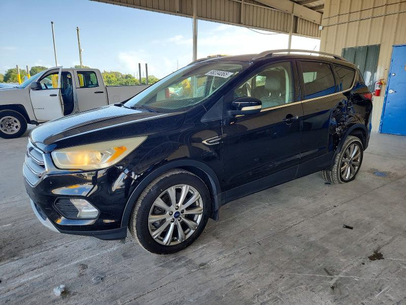 FORD ESCAPE TIT 2017 with VIN 1FMCU9J9XHUB13408 - Photo from auction