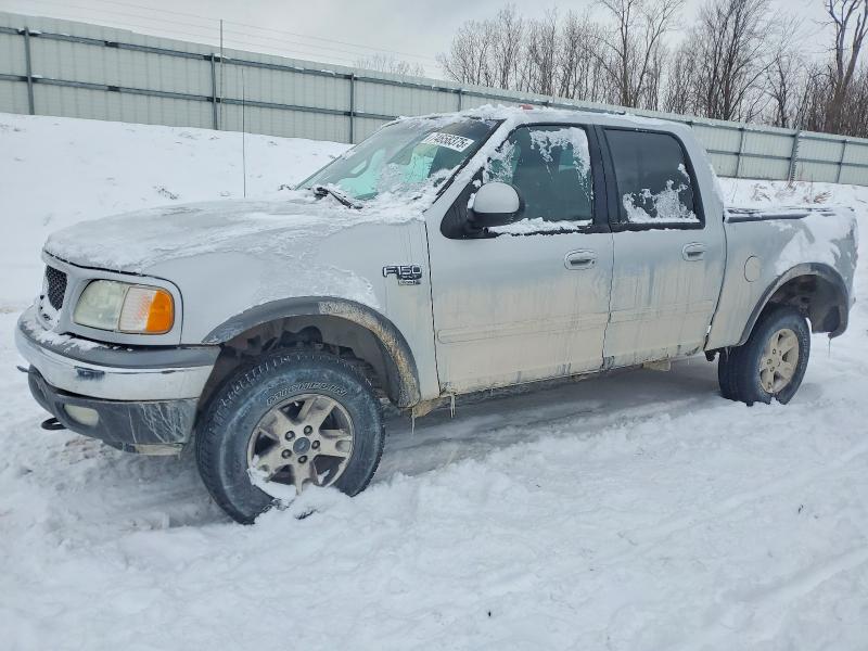FORD F150 2002 with VIN 1FTRW08L22KA73849 - Photo from auction