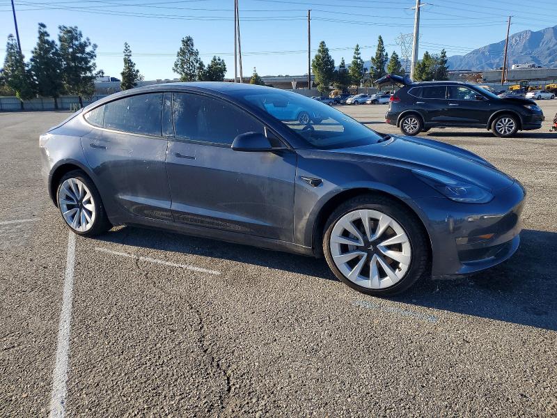 Photo 4 from auction – 2022 TESLA MODEL 3 with VIN 5YJ3E1EA6NF374837
