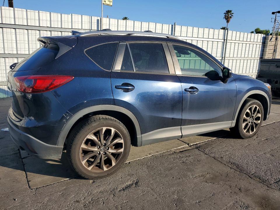 Photo 3 from auction – 2016 MAZDA CX-5 with VIN JM3KE2DY9G0678043