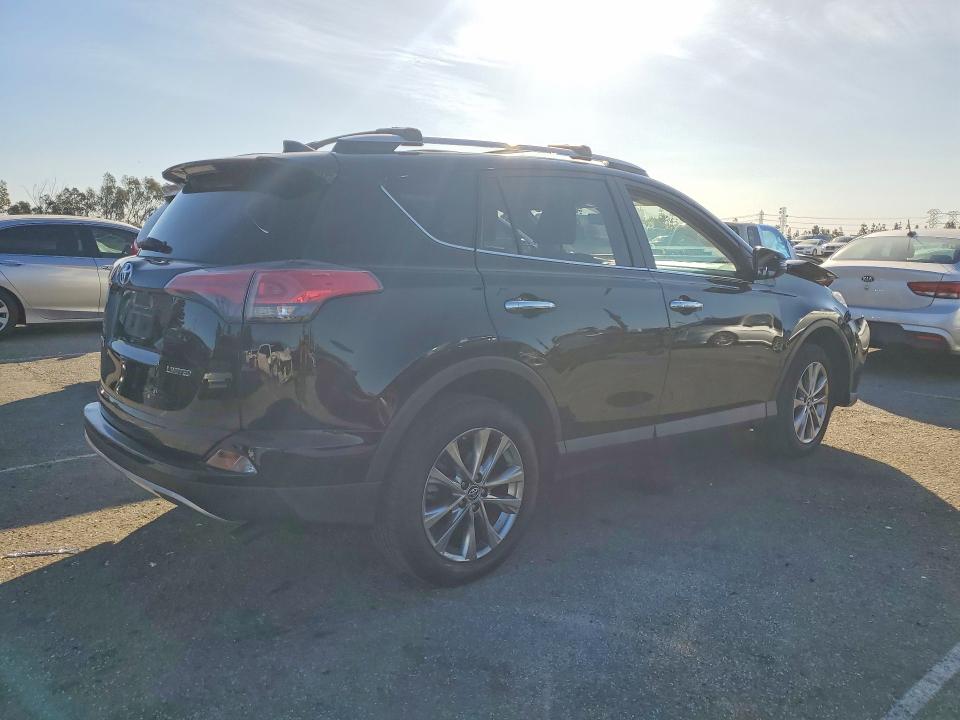 Photo 3 from auction – 2018 TOYOTA RAV4 with VIN 2T3YFREV3JW473687