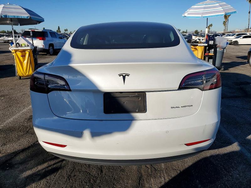 Photo 6 from auction – 2021 TESLA MODEL 3 with VIN 5YJ3E1EB6MF003314