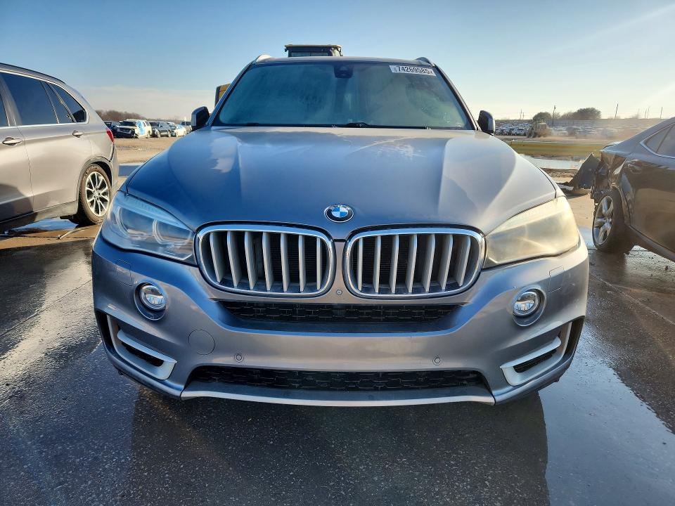 Photo 5 from auction – 2015 BMW X5 XDRIVE5 with VIN 5UXKR6C59F0J75458