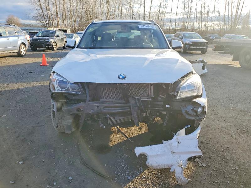 Photo 5 from auction – 2015 BMW X1 XDRIVE2 with VIN WBAVL1C53FVY38560