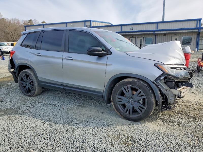 Photo 4 from auction – 2021 HONDA PASSPORT with VIN 5FNYF7H23MB003577