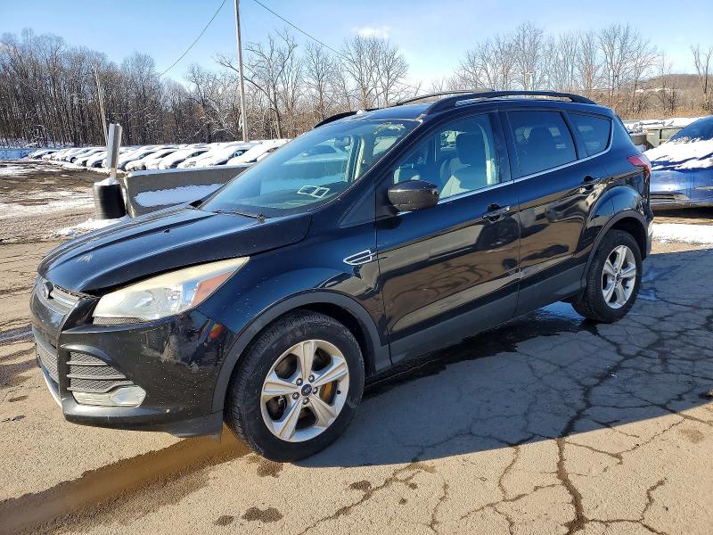 FORD ESCAPE SE 2015 with VIN 1FMCU9GX0FUA13787 - Photo from auction