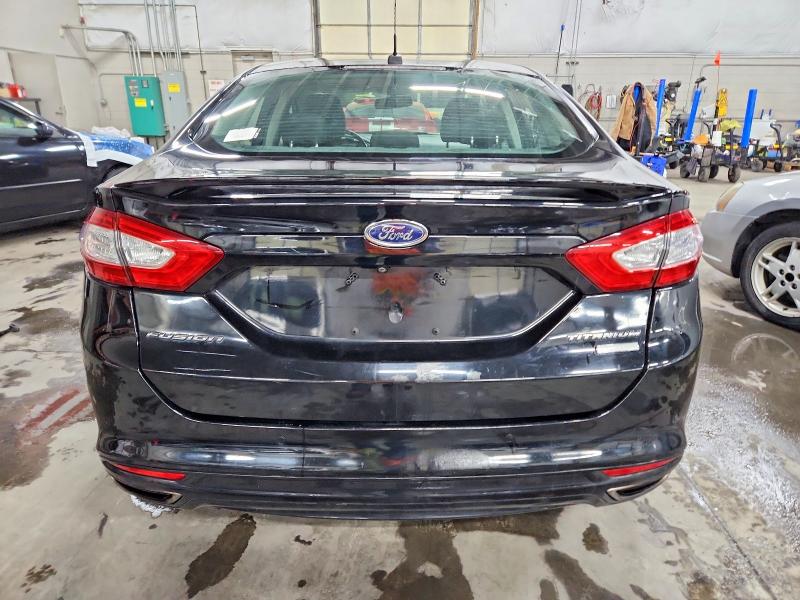 Foto 6 de la subasta – 2016 FORD FUSION TIT con VIN 3FA6P0K96GR390412