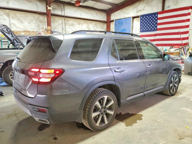 Photo 3 from auction – 2023 HONDA PILOT ELIT with VIN 5FNYG1H81PB035267