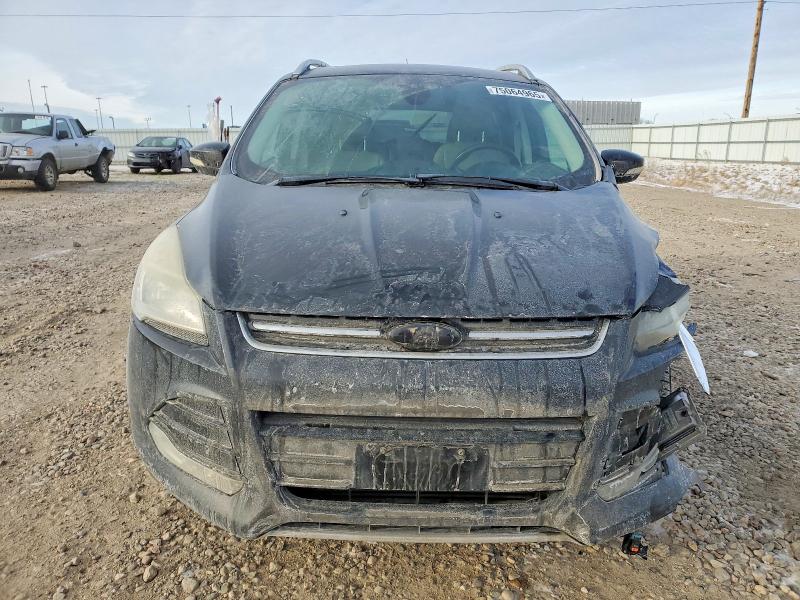 Photo 5 from auction – 2015 FORD ESCAPE with VIN 1FMCU0J90FUB25575