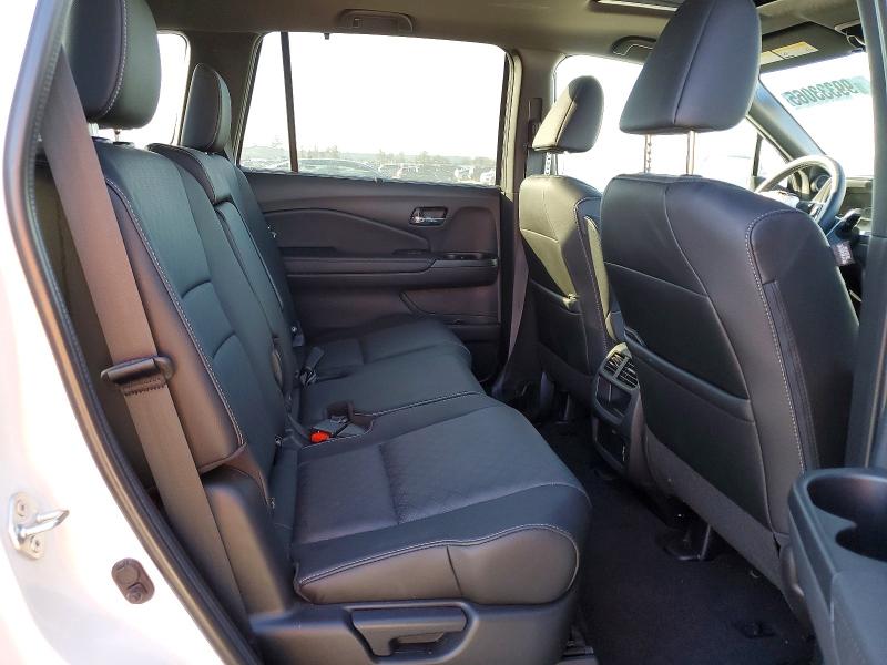Photo 11 from auction – 2021 HONDA PASSPORT E with VIN 5FNYF7H5XMB015591