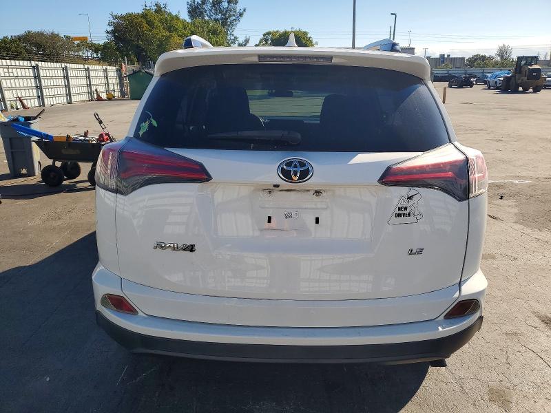 Photo 6 from auction – 2017 TOYOTA RAV4 with VIN JTMZFREV5HJ710130