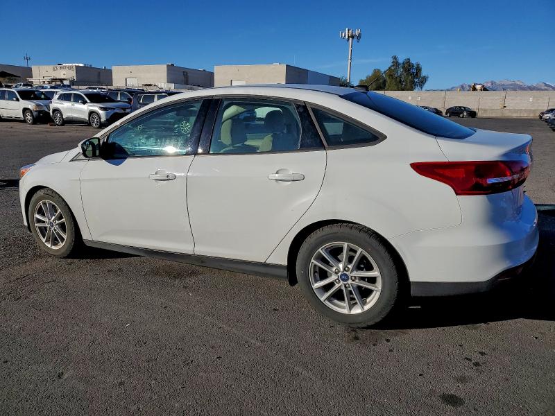 Photo 2 from auction – 2018 FORD FOCUS SE with VIN 1FADP3F23JL230659