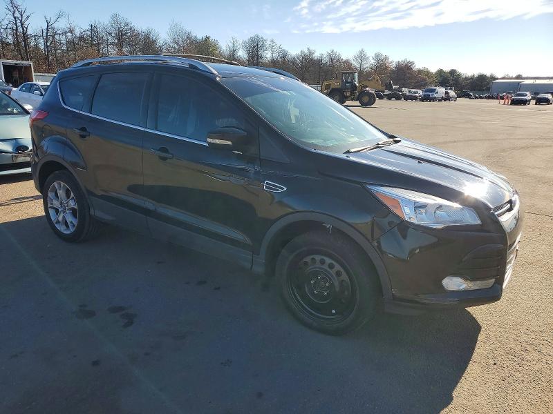 Photo 4 from auction – 2016 FORD ESCAPE TIT with VIN 1FMCU9JX9GUB50804