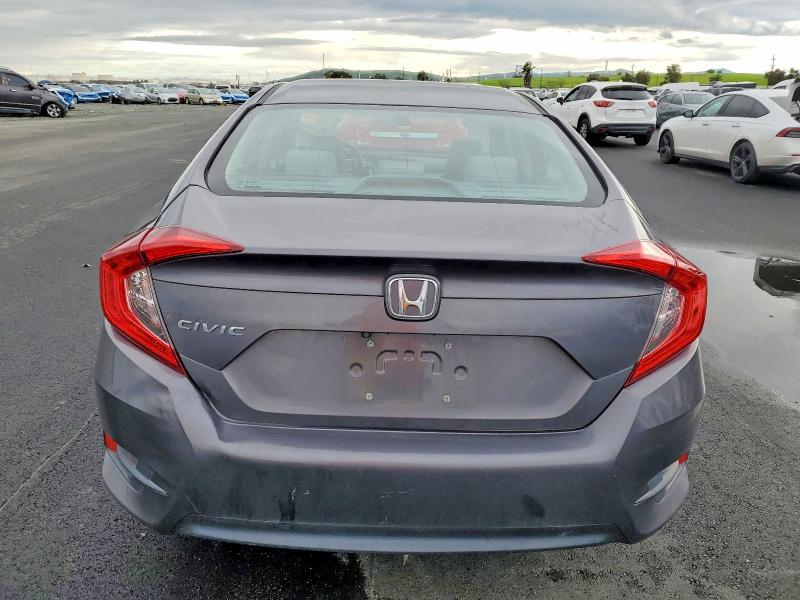 Photo 6 from auction – 2018 HONDA CIVIC LX with VIN 2HGFC2F50JH510072