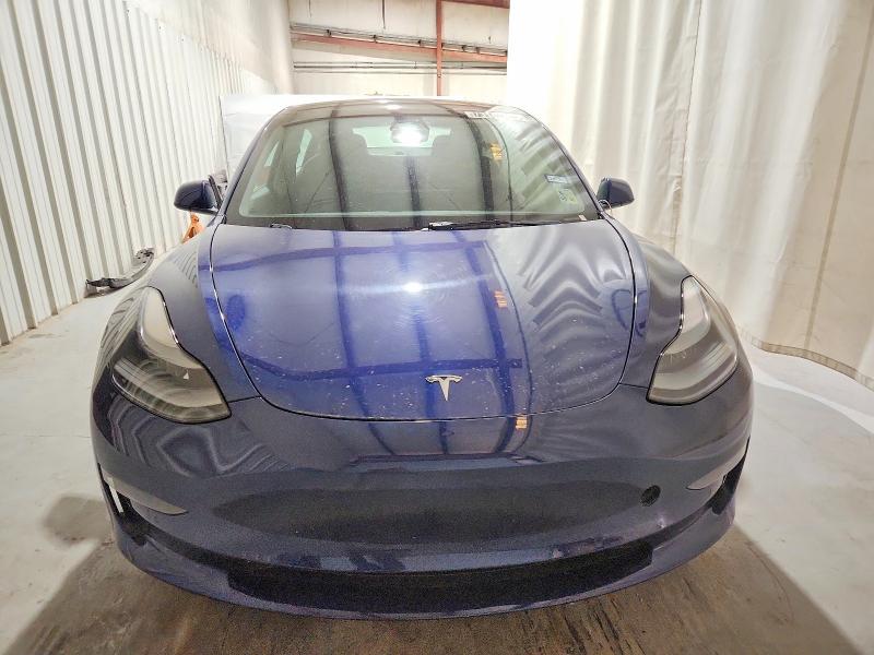 Photo 5 from auction – 2022 TESLA MODEL 3 with VIN 5YJ3E1EA9NF288292