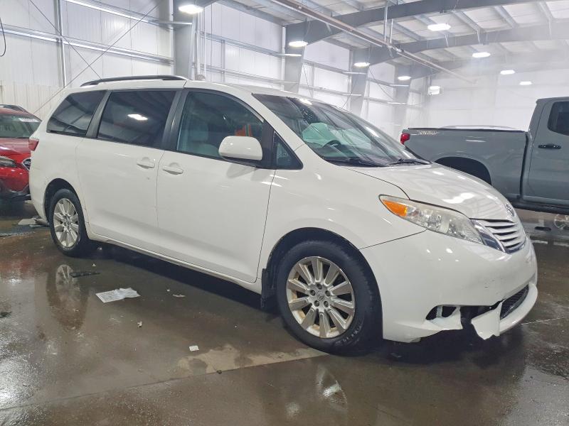 Photo 4 from auction – 2015 TOYOTA SIENNA LE with VIN 5TDJK3DC8FS110353
