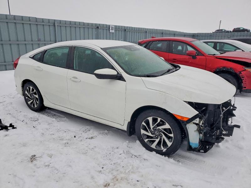Photo 4 from auction – 2018 HONDA CIVIC LX with VIN 2HGFC2F67JH027400