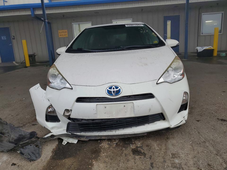 Photo 5 from auction – 2014 TOYOTA PRIUS C with VIN JTDKDTB34E1575127